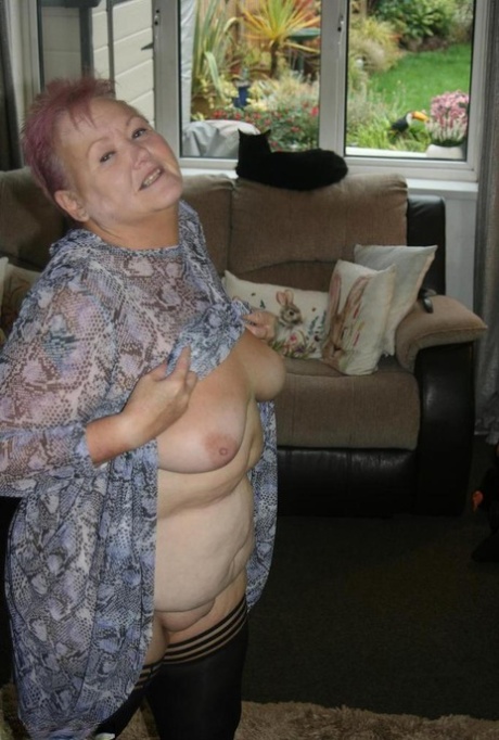 mature granny strips sex image